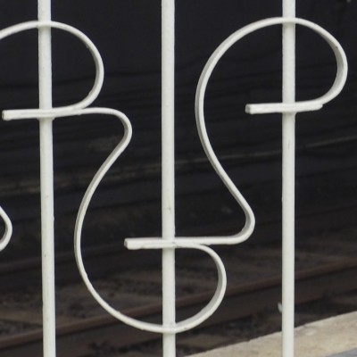 Painted Iron Fence Smiley